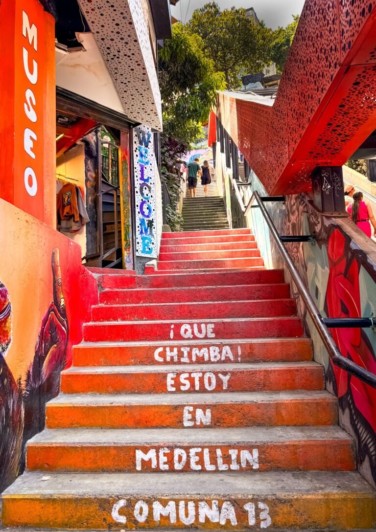 Painted outdoor staircase covered in street art in Comuna 13, Medellín